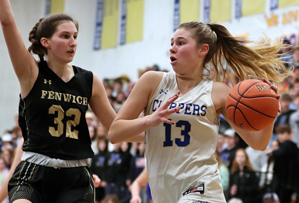 Norwell's Grace Oliver drives to the basket during an Elite Eight game in the state tournament against Bishop Fenwick on Friday, March 11, 2022.