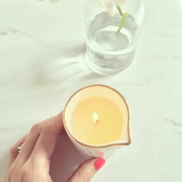 <p>With wax designed to melt down to the perfect temperature, these candles transform from mood-setting flickers to therapeutic oil and lotion blends. They're 100 percent safe for your skin—so light them up and slather them on.</p>
