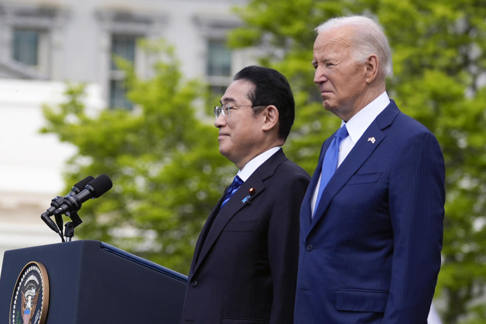 President Joe Biden and Japanese Prime Minister Fumio Kishida stand for the National Anthem during a State Arrival Ceremony on the South Lawn of the White House, Wednesday, April 10, 2024, in Washington. (AP Photo/Alex Brandon)