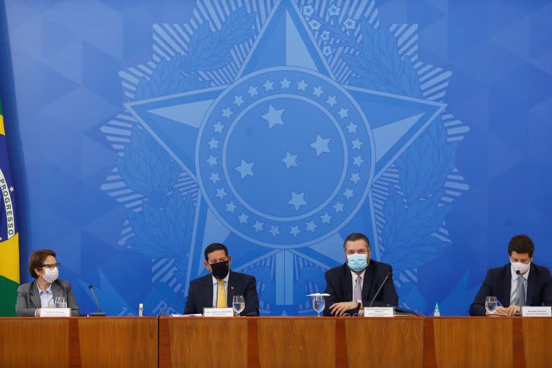 Brazil's Agriculture Minister Tereza Cristina, Vice President Hamilton Mourao, Foreign Minister Ernesto Araujo and Environment Minister Ricardo Salles attend a news conference at the Planalto Palace in Brasilia