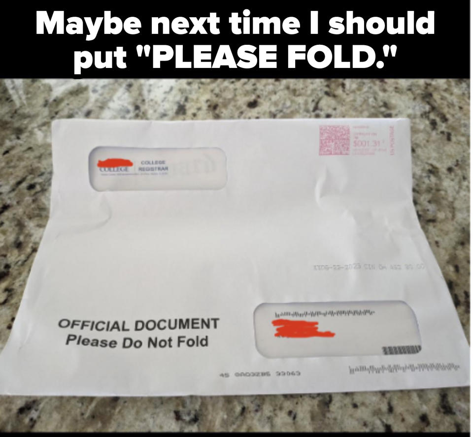 A bent large envelope, with caption "Maybe next time I should put 'PLEASE FOLD'"