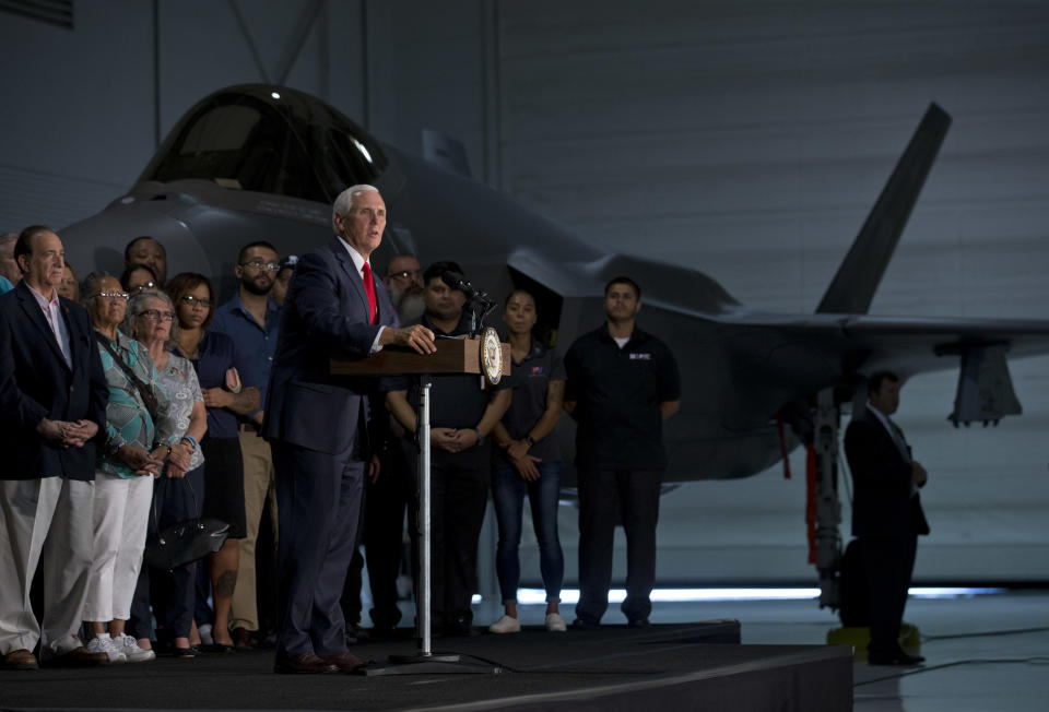 Vice President Mike Pence speaks in front of a F-35 Lightning II fighter jet during a visit to Nellis Air Force Base in Las Vegas, Friday, Sept. 7, 2018. (Steve Marcus/Las Vegas Sun via AP)