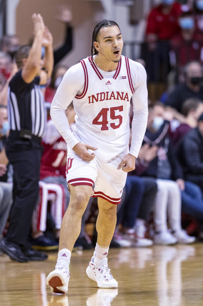 Indiana guard Parker Stewart (45) reacts after hitting a three-point basket during the first half of an NCAA college basketball game against Minnesota, Sunday, Jan. 9, 2022, in Bloomington, Ind. (AP Photo/Doug McSchooler)