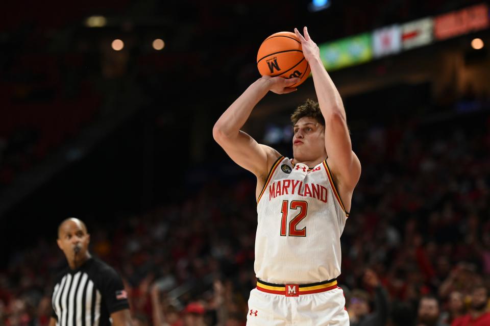 Feb 28, 2024; College Park, Maryland, USA; Maryland Terrapins forward Jamie Kaiser Jr. (12) shoots a three point basket against the Northwestern Wildcats at Xfinity Center. Mandatory Credit: Tommy Gilligan-USA TODAY Sports