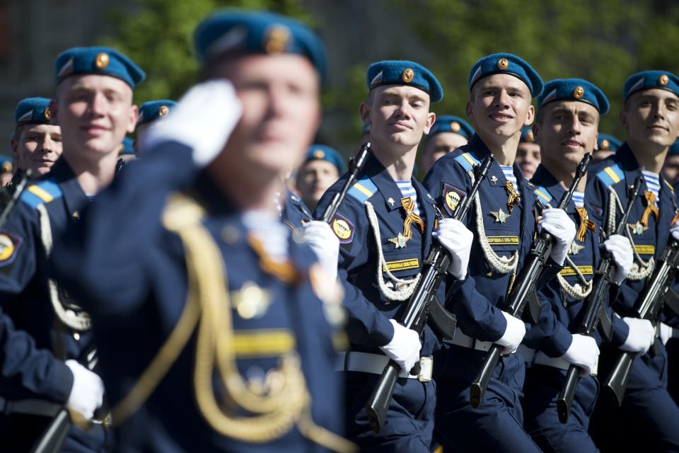 Russian paratroopers march during the Victory Day Parade in Red Square in Moscow, Russia, Friday, May 9, 2014. Thousands of Russian troops marched on Red Square in the annual Victory Day parade in a proud display of the nation's military might amid escalating tensions over Ukraine. (AP Photo/Pavel Golovkin)