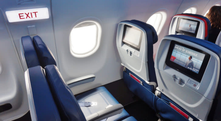 Inside the airplane cabin of a Delta flight.