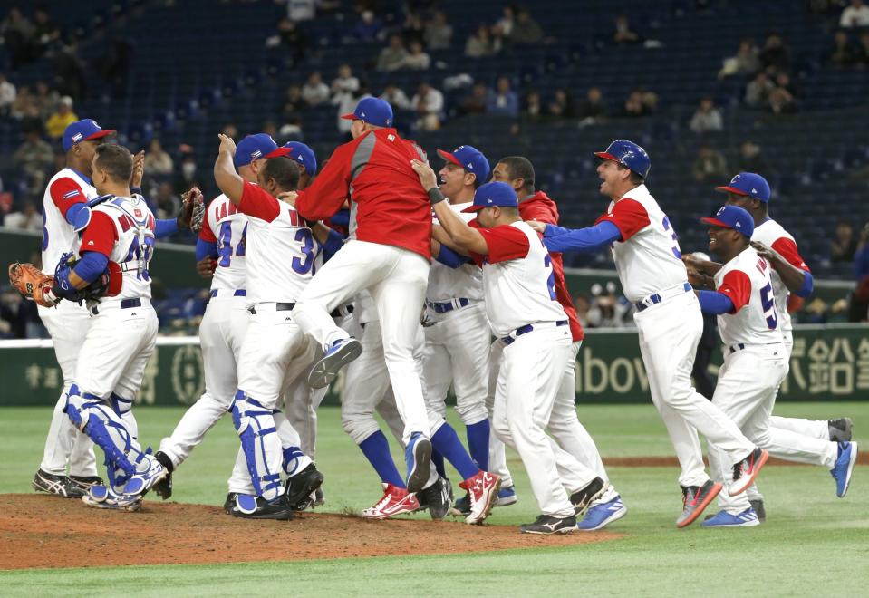 Cuba celebrates after advancing to the second round of the WBC. (AP)