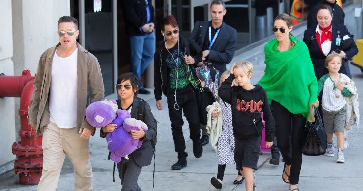 Brad Pitt and Angelina Jolie at Los Angeles International Airport with their children [Getty/GVK/Bauer-Griffin]