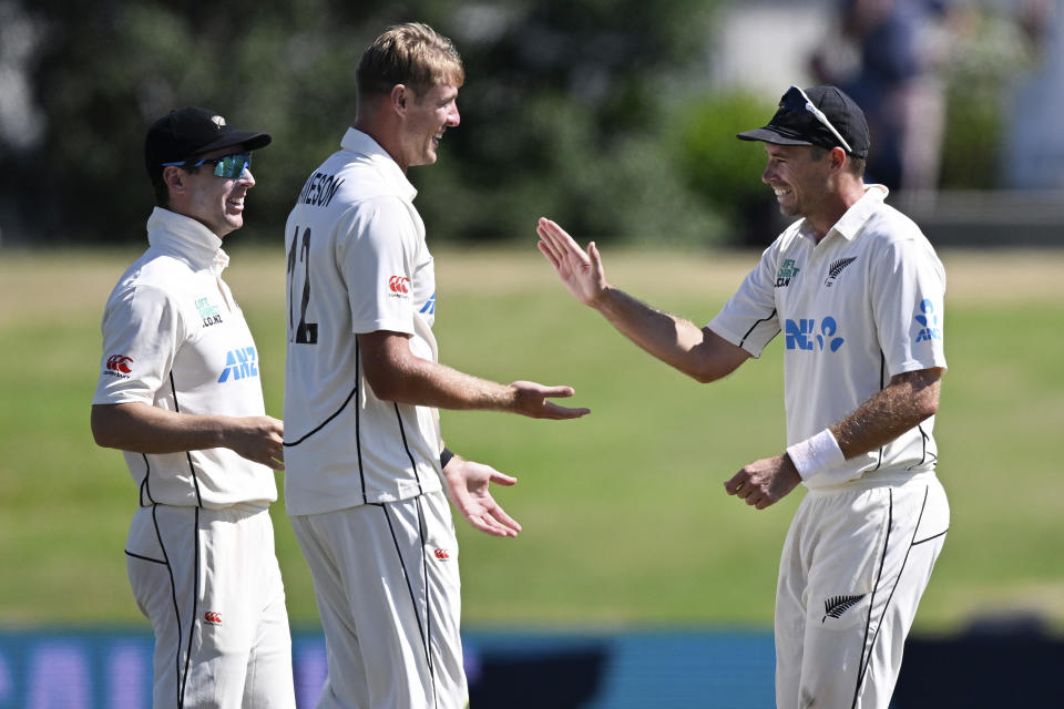 New Zealand's Kyle Jamieson, centre, is congratulated by teammate's Matt Henry, and Tim Southee, right, following the wicket of South Africa's David Bedingham on day four of the first cricket test between New Zealand and South Africa at Bay Oval, Mt Maunganui, New Zealand, Wednesday, Feb. 7, 2024. (Photo: Andrew Cornaga/Photosport via AP)