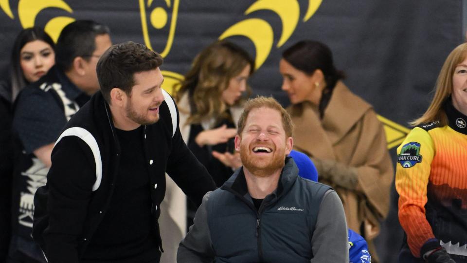 Prince Harry and Michael Buble share a joke