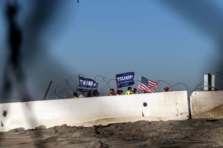 Pro-Trump demonstrators protest near the US-Mexico border in Imperial Beach, San Diego County