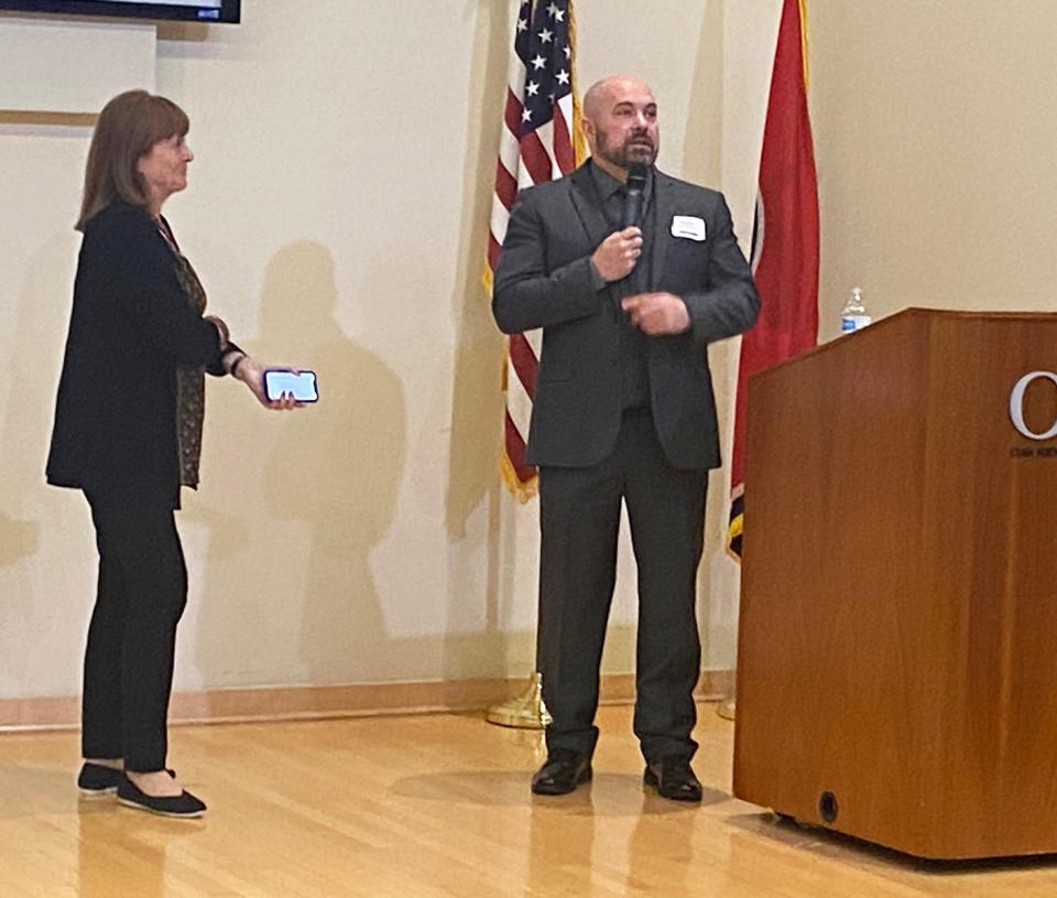 FBI Special Agent Andy Crabtree, right, speaks on hate crimes as part of Oak Ridge's "Roots of America" talks. Whether interstate commerce was affected is key to whether a person is charged with committing a hate crime. At left is Bonnie Carroll, the emcee for the "Roots" talk on hate crimes.