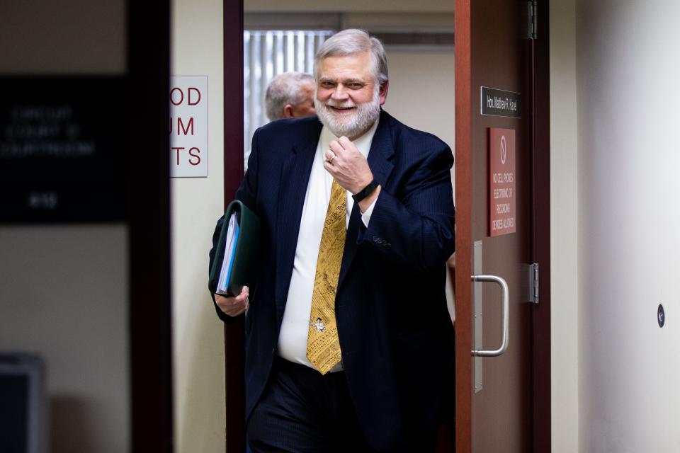 David Kallman of Kallman Legal Group leaves the courtroom Friday, March 31, 2023, in Muskegon.