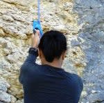 Climber using ascender as a belay device.