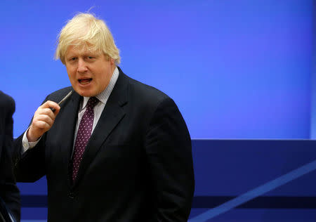 British Foreign Minister Boris Johnson walks at the morning ministerial plenary for the Global Coalition working to Defeat ISIS at the State Department in Washington, U.S., March 22, 2017. REUTERS/Joshua Roberts