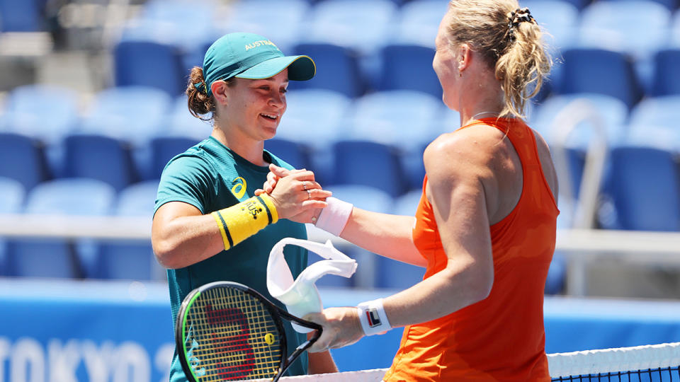 Ash Barty and Kiki Bertens, pictured here sharing a practice at the Tokyo Olympics.