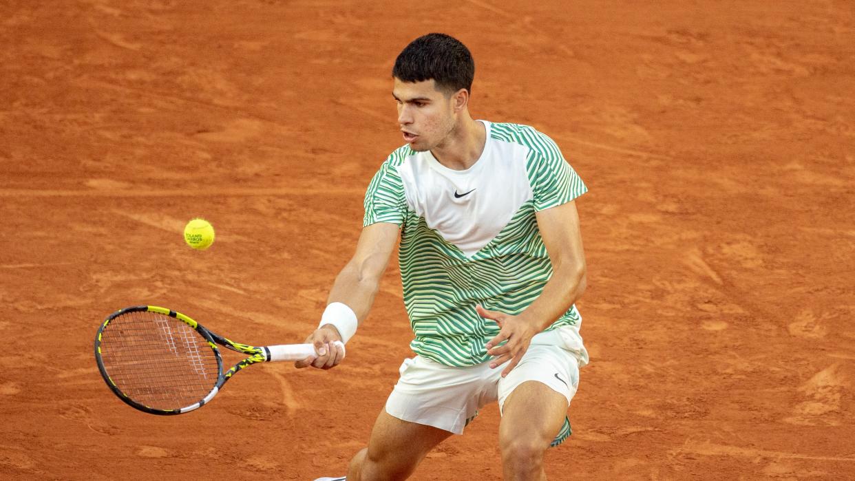  Carlos Alcaraz of Spain in action in the first round of the singles competition on Court Suzanne Lenglen during the 2023 French Open Tennis Tournament at Roland Garros 