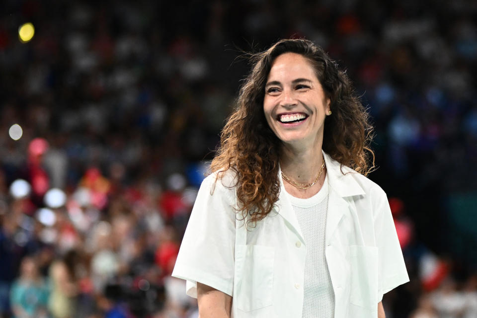 US basketball player Sue Bird opens the session in the women's Gold Medal basketball match between France and the USA during the Paris 2024 Olympic Games at the Bercy  Arena in Paris on August 11, 2024. (Photo by Aris MESSINIS / AFP) (Photo by ARIS MESSINIS/AFP via Getty Images)