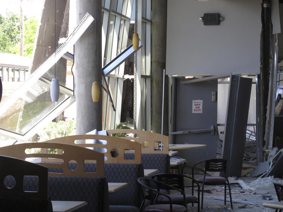 A first-floor cafeteria at a University of Nevada, Reno dormitory was damaged after a July 5 natural gas explosion blew out walls and windows in Reno, Nev., Thursday, July 11, 2019. School officials gave members of the media their first up-close look at the exterior and interior damage on Thursday. Only eight people suffered minor injuries in the explosion at the mostly empty dorm. (AP Photo/Scott Sonner)