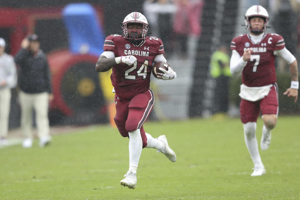 South Carolina running back Mario Anderson (24) breaks free for a 72-yard touchdown run during the second half of an NCAA college football game against Vanderbilt on Saturday, Nov. 11, 2023, in Columbia, S.C. (AP Photo/Artie Walker Jr.)