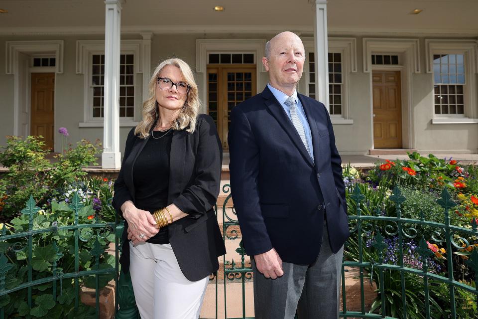 Barbara Jones Brown and Richard Turley, co-authors of “Vengeance is Mine,” pose for a portrait in front of Brigham Young’s Office in Salt Lake City on Friday, May 12, 2023. The opening scene of their book takes place where they are standing. | Kristin Murphy, Deseret News