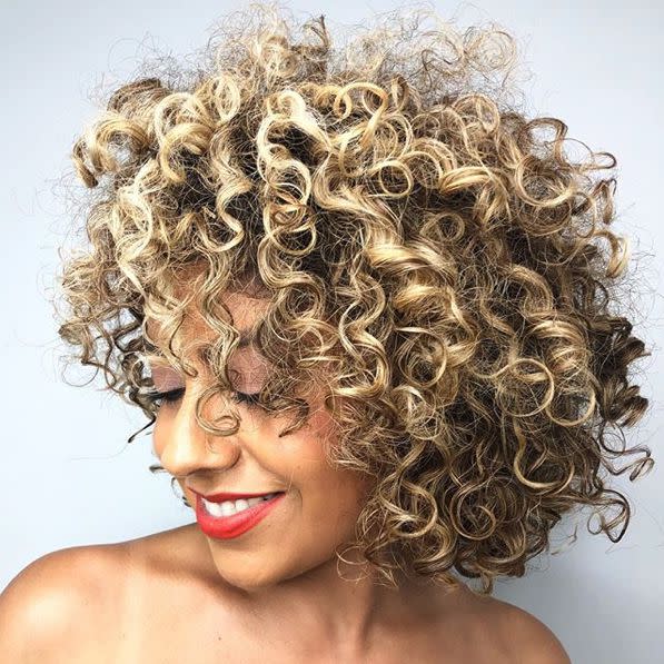 <p>If you're blessed with curls, you're already set with volume when given the right hairstyle. A layered lob should give you all the volume you could ask for!</p>