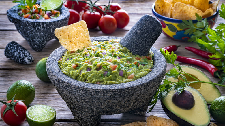 Guacamole and salsa mixed together