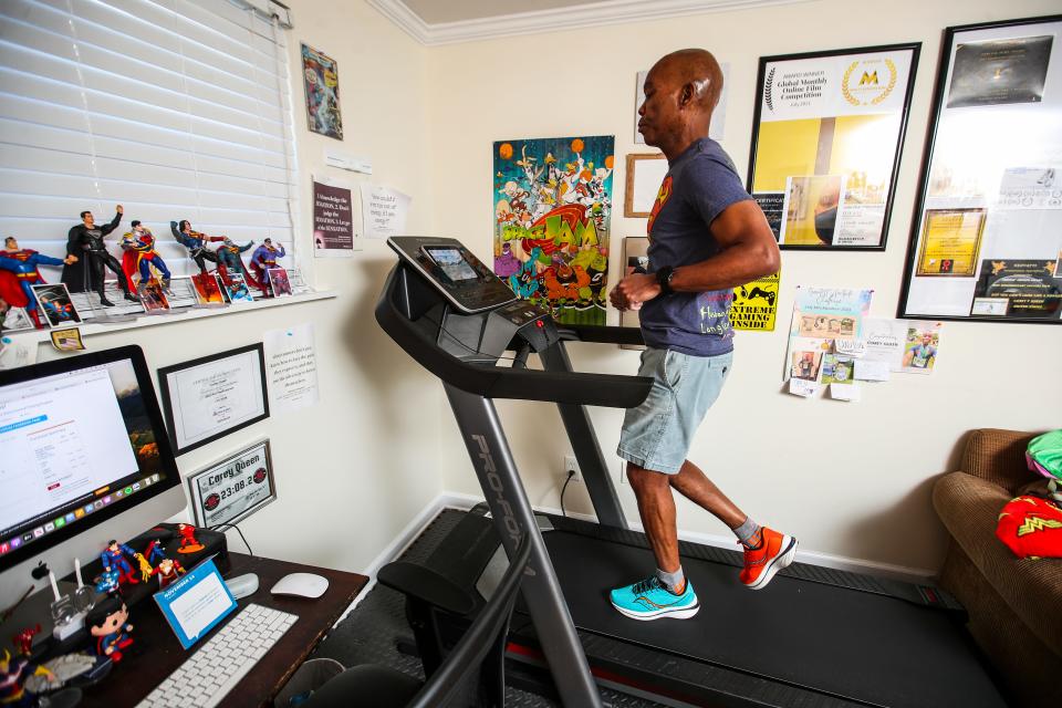 Corey Queen will often run on his treadmill early in the morning to get a run in; he actually prefers running outside during inclement weather. Nov. 14, 2023.