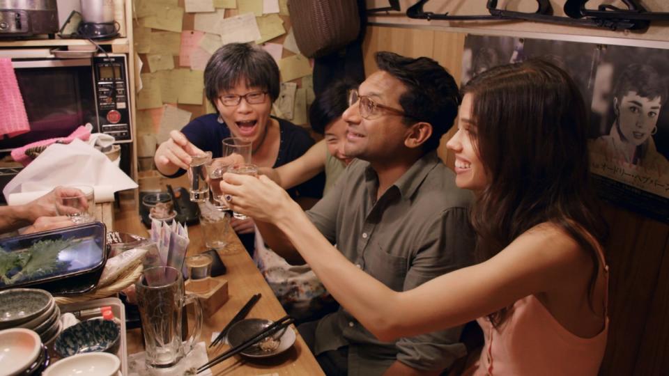 Ravi Patel, center, and Mahaley Patel, far right, get drinks in the "Overparenting in Japan" episode.