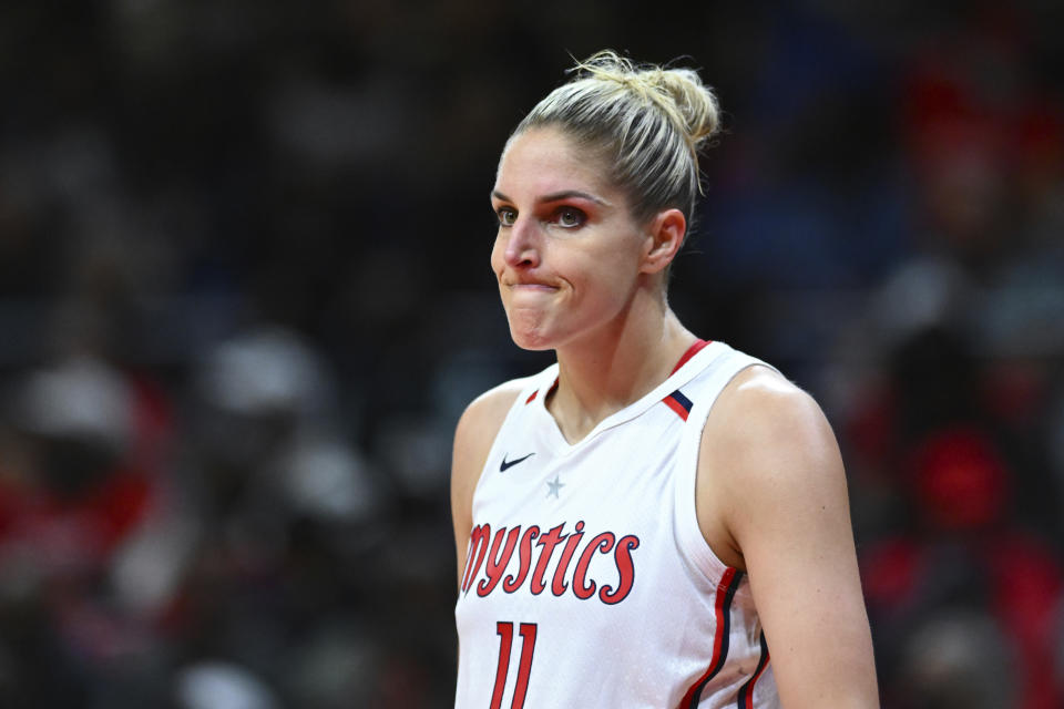 FILE - Washington Mystics' Elena Delle Donne (11) looks on during a break in the action in the first half of a WNBA basketball game against the Indiana Fever, Friday, May 6, 2022, in Washington. After two seasons in which she barely played, Washington Mystics star Elena Delle Donne is back -- and still looking like one of the WNBA's top players. (AP Photo/Terrance Williams, File)