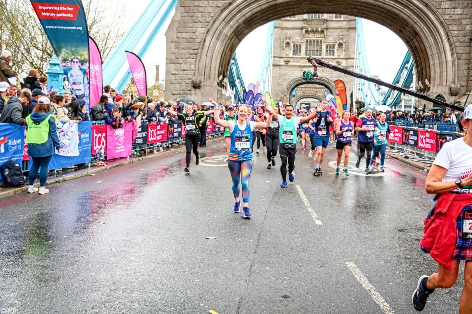 Ruth Chappell running over Tower Bridge at last year's London Marathon. (Supplied)