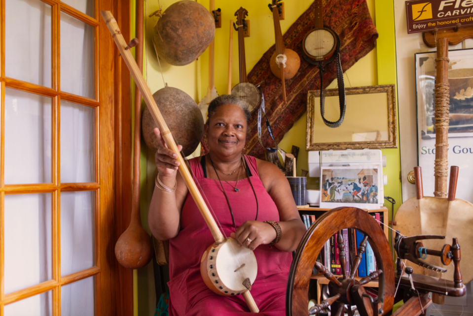 Gourd banjo maker Dena Ross Jennings with some of her collection