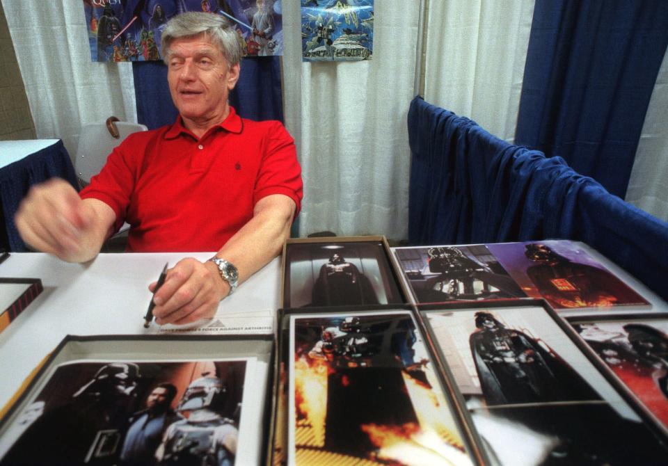 Dave Prowse, the original Darth Vader from the "Star Wars Trilogy," poses during the New York Comic and Fantasy Creators Convention Friday, May 7, 1999. The new movie, "Star Wars: Episode I The Phantom Menace," will make it's way to theaters  May 19th. (AP Photo/Lynsey Addario)