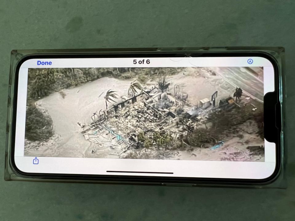 This photo shows a picture on the phone of Barb Burnette, a Boca Grande resident. Burnette's photo shows the South Beach Bar & Grille, a popular Boca Grande restaurant that burned to the ground during Hurricane Ian.