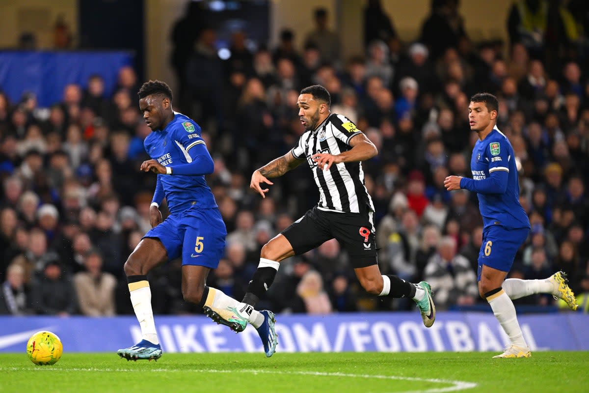 Benoit Badiashile of Chelsea is challenged by Callum Wilson of Newcastle United (Getty Images)
