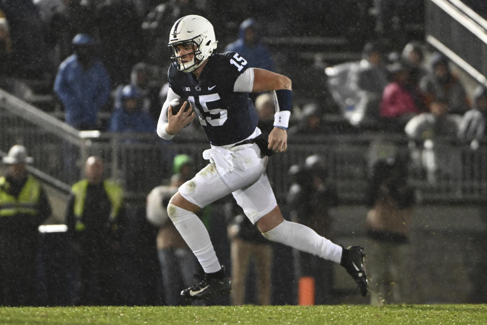 FILE - Penn State quarterback Drew Allar (15) scrambles during the second half of an NCAA college football game against Maryland, Saturday, Nov. 12, 2022, in State College, Pa. The former five-star quarterback recruit has not even officially won Penn State’s starting job yet, but glimpses of his game suggest he could be the star the Nittany Lions need to bust the recent Michigan/Ohio State monopoly in the Big Ten.(AP Photo/Barry Reeger, File)