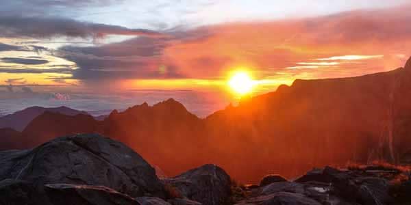 <b>Summit Mt Kinabalu</b> Mt Kinabalu is a great two-day, one-night hike.. The first day draws to a close after 4-7 hours of hiking at the 3272m Laban Rata guesthouse. Then, at 2am the next morning, it’s time to don head-torches, scramble up on ropes in the dark and make it to the 4,095m summit for dawn. You’re way above the cloud line, so said sunrise tends to be pretty darned special (and worth getting up in the dark for).