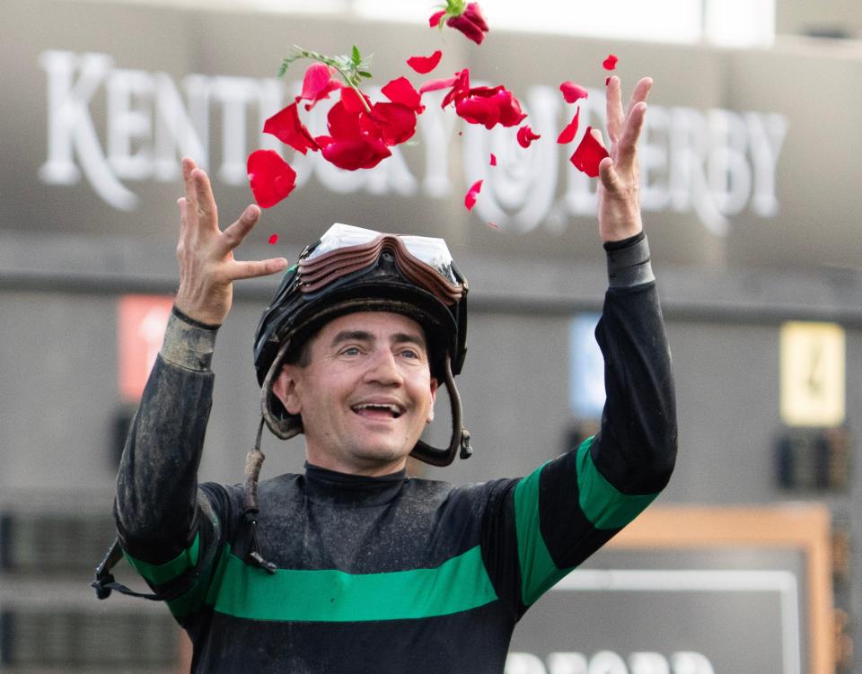 Jockey Brian Hernandez Jr. celebrates after riding Mystik Dan to victory during the 150th Kentucky Derby at Churchill Downs.