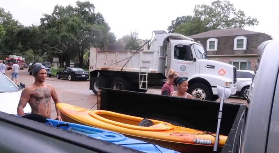 Regis Prograis (L) is shown in the aftermath of Hurricane Harvey. (Courtesy of Regis Prograis)