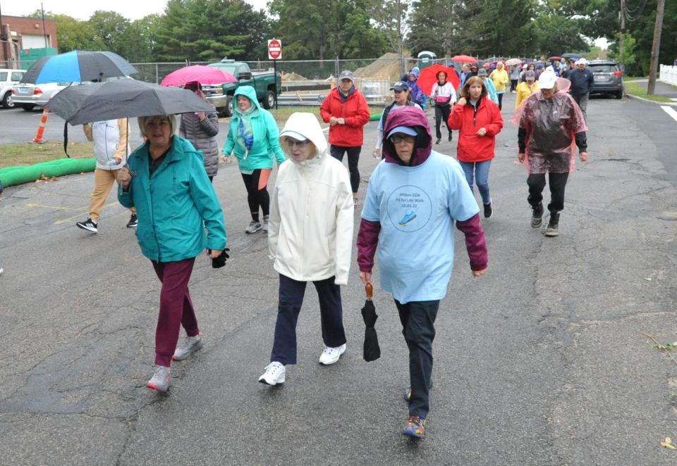 Walkers head out for the Milton Council on Aging's Fit for Life Walk hosted by Milton Boot Camp, Saturday, Oct. 1, 2022.