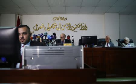 Judge Medhat al-Mahmoud, presiding over the supreme federal court, reads a verdict on appeals concerning amendment of an election law in Baghdad, Iraq June 21, 2018. REUTERS/Abdullah Dhiaa al-Deen