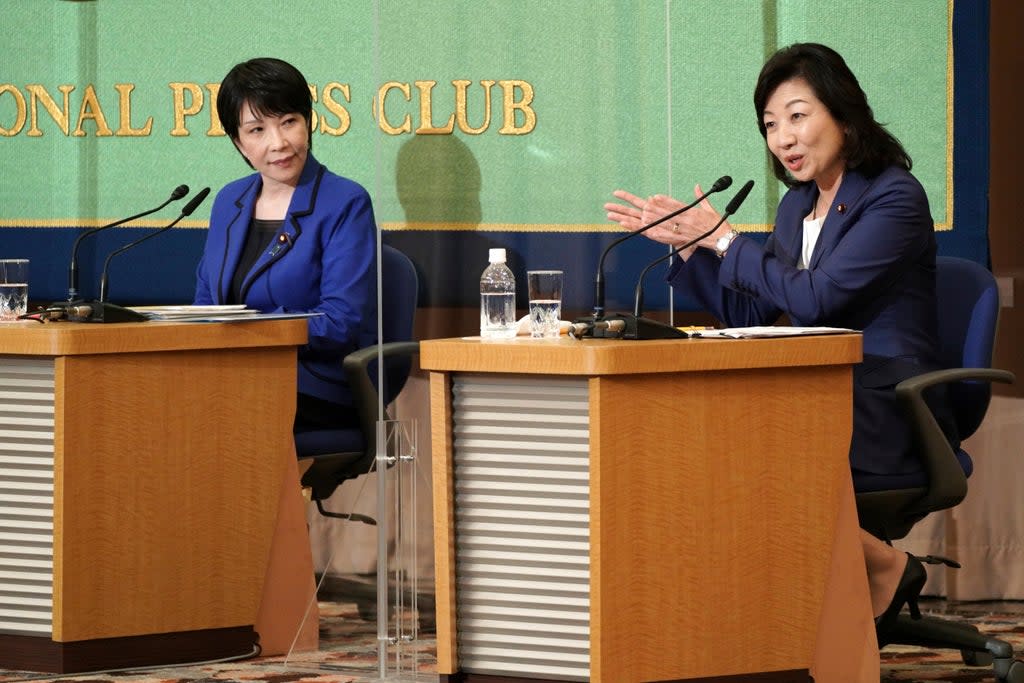 Japan Politics Two Women (Copyright 2021 The Associated Press. All rights reserved)