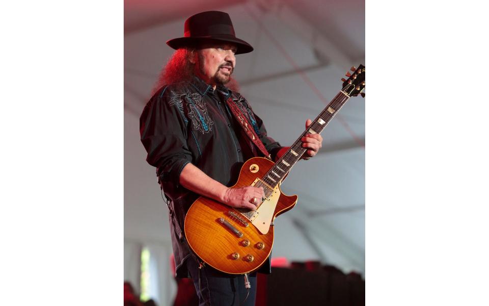 Gary Rossington of the band Lynyrd Skynyrd performs June 26, 2015, in Dover, Del. Rossington, Lynyrd Skynyrd’s last surviving original member who also helped to found the group, died Sunday, March 5, 2023, at the age of 71. (Photo by Owen Sweeney/Invision/AP, File)