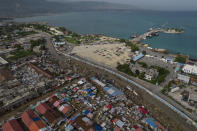 The Croix des Bossales market, translated from Creole to the Slaves Market, a gang-controlled area, is located in the port district of La Saline in Port-au-Prince, Haiti, Monday, Oct. 4, 2021. Gangs control up to 40% of Port-au-Prince, a city of more than 2.8 million people where gangs fight over territory daily. (AP Photo/Rodrigo Abd)