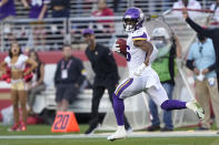 Minnesota Vikings' Kene Nwangwu returns a kickoff for a touchdown against the San Francisco 49ers during the second half of an NFL football game in Santa Clara, Calif., Sunday, Nov. 28, 2021. (AP Photo/Tony Avelar)