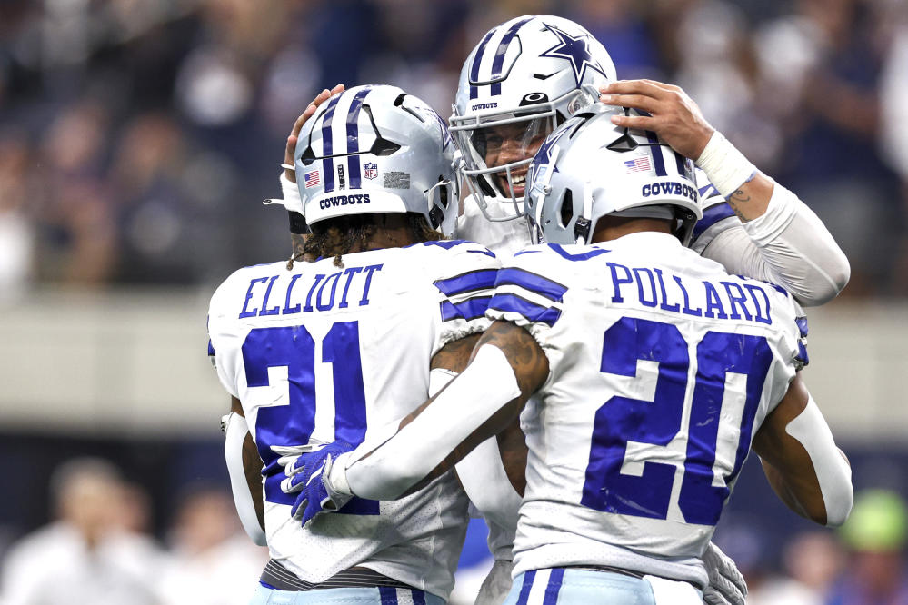 Dallas Cowboys quarterback Dak Prescott (4) scrambles before throwing a  pass during an NFL football game against the Detroit Lions in Arlington,  Texas, Sunday, Oct. 23, 2022. (AP Photo/Tony Gutierrez Stock Photo - Alamy