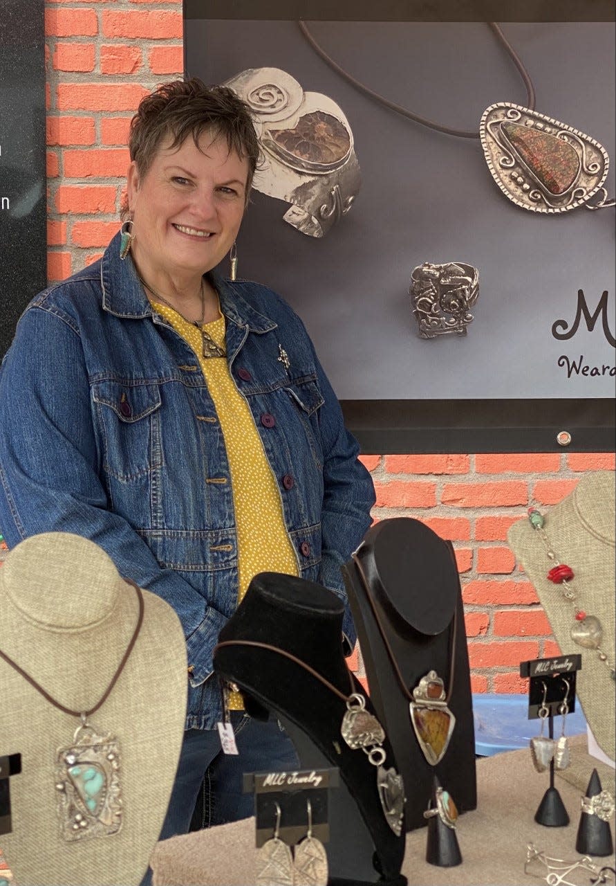 Mary Lou Christie with her jewelry display at an art show in Ponca City, Oklahoma.