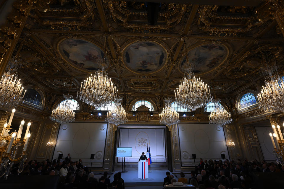 French President Emmanuel Macron delivers a speech ahead of his visit in Central Africa, at the Elysee Palace in Paris, Monday, Feb. 27, 2023. French President Emmanuel Macron unveiled his country's changing economic and military strategy in Africa for the coming years, as France's influence substantially declines on the continent. Macron begins an ambitious Africa trip on Wednesday to Gabon, Angola, the Republic of Congo and Congo.( Stefano Rellandini, Pool via AP)