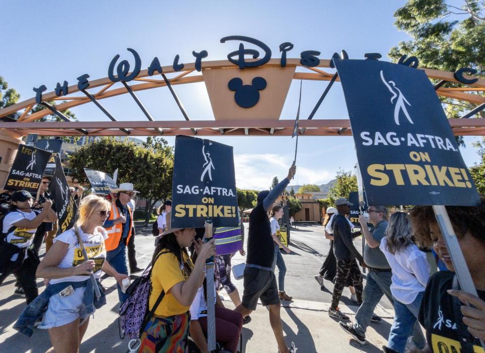 SAG-AFTRA members picket outside Disney