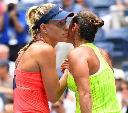 Sept 6, 2016; New York, NY, USA; Angelique Kerber of Germany (l) after beating Roberta Vinci of Italy on day nine of the 2016 U.S. Open tennis tournament at USTA Billie Jean King National Tennis Center. Mandatory Credit: Robert Deutsch-USA TODAY Sports